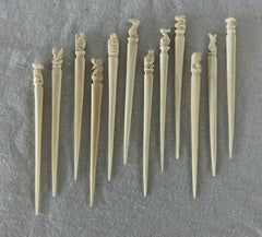 12 Vtg Totem Carved bone PICKS Appetizers Hors d 'Oeuvres 60s Tiki