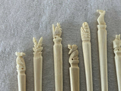 12 Vtg Totem Carved bone PICKS Appetizers Hors d 'Oeuvres 60s Tiki