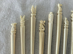 12 Vtg Totem Carved bone PICKS Appetizers Hors d 'Oeuvres 60s Tiki