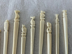 12 Vtg Totem Carved bone PICKS Appetizers Hors d 'Oeuvres 60s Tiki
