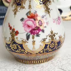 Antique cobalt blue and handpainted flower decorated porcelain vase
