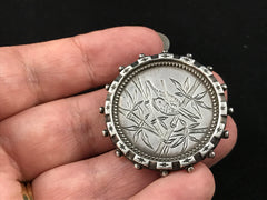 Victorian silver Aesthetic Movement brooch engraved with a bird in bamboo