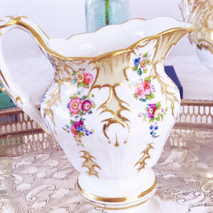 Antique Ridgway foliage shape milk jug, handpainted flowers