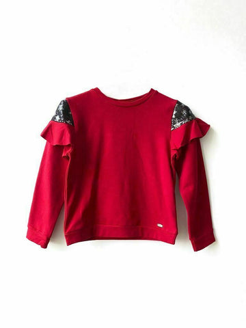 test Maglia con paillettes e volant
