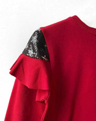test Maglia con paillettes e volant
