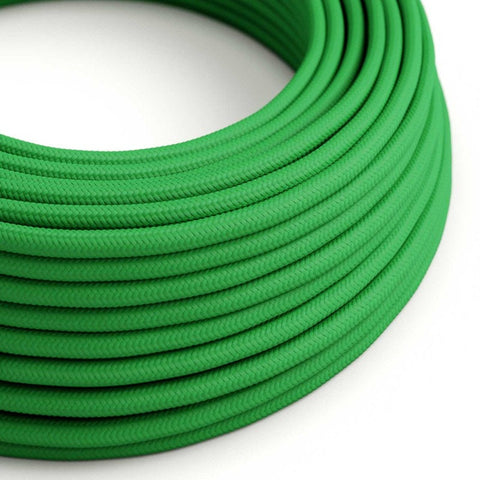 Green round electric cable, covered by cotton solid fabric, color white, textile lamp wire.