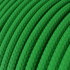Green round electric cable, covered by cotton solid fabric, color white, textile lamp wire.