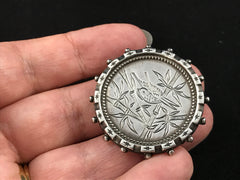 Victorian silver Aesthetic Movement brooch engraved with a bird in bamboo